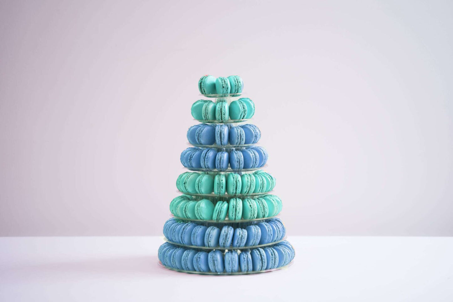 Eight tier conical tower containing 175 macaroons, half blue half duck egg blue.