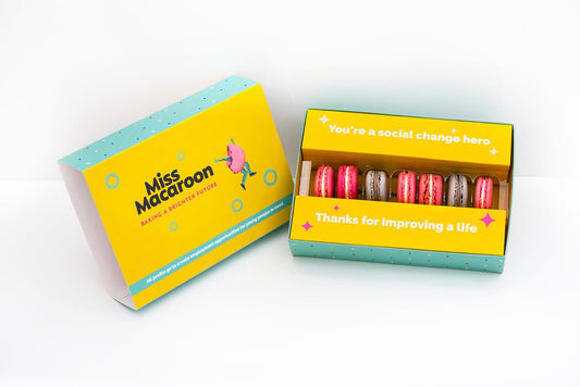 2 Boxes of 7 Macaroons displayed with macaroons in one of them visible as the lid of the box is open