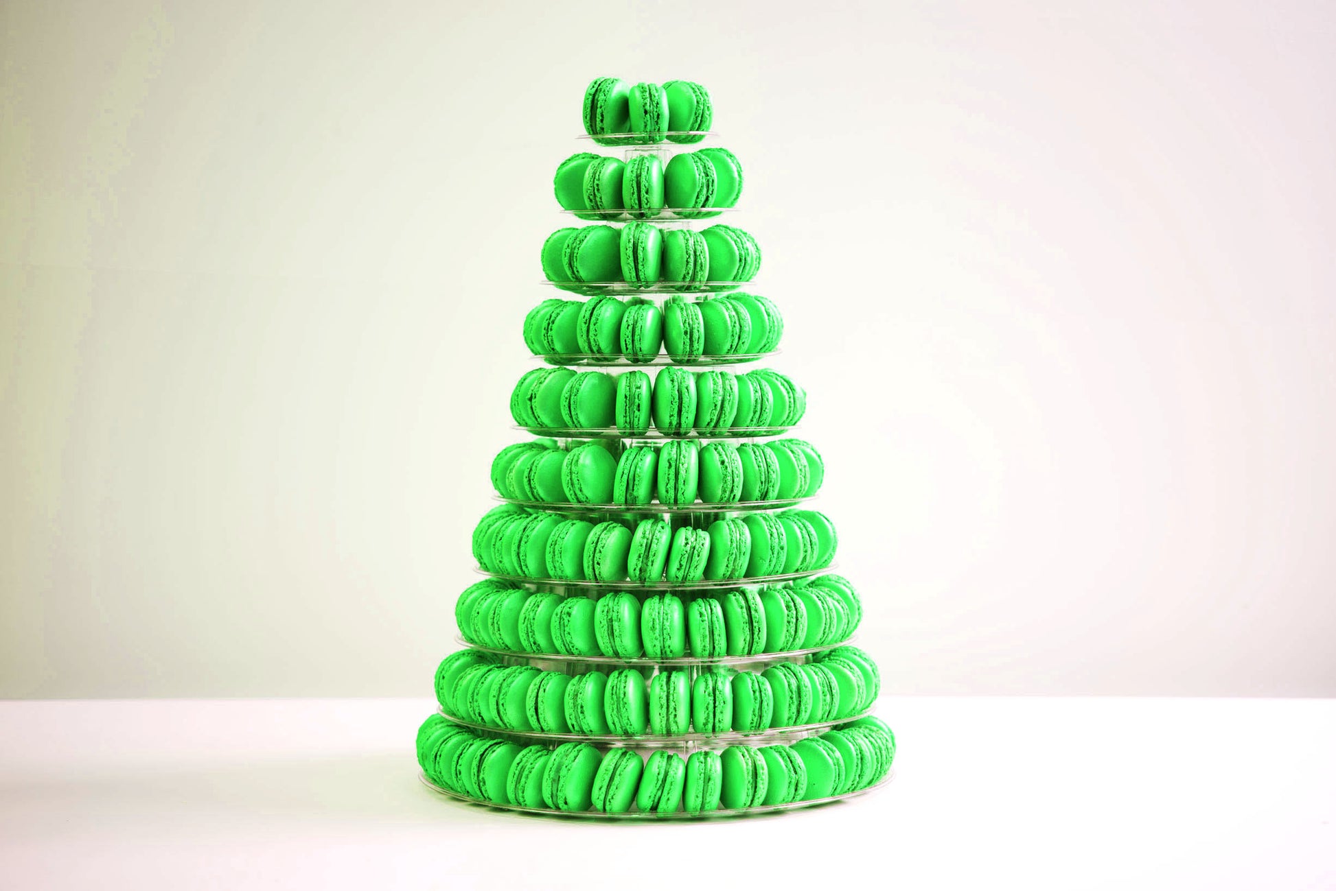 Ten tier tower of 240 green pistachio macaroons, which looks like a Christmas tree